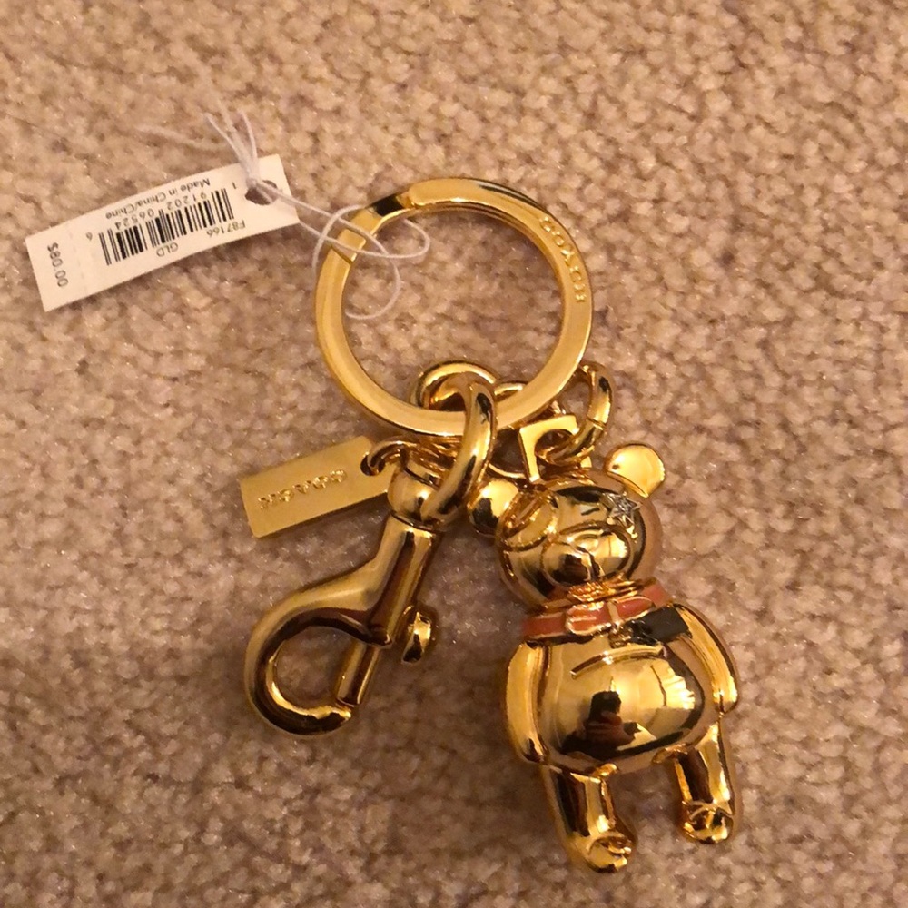 Coach gold bear bag charm